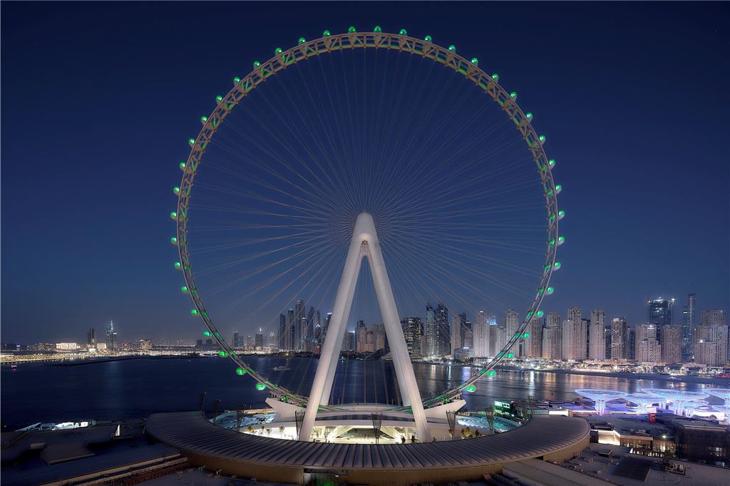 Vahle mit Hendrik Wüst als Wirtschaftsbotschafter in Abu Dhabi Das weltweit größten Riesenrad, das Ain Dubai, strahlt beleuchtet vor dem dunklen Nachthimmel.