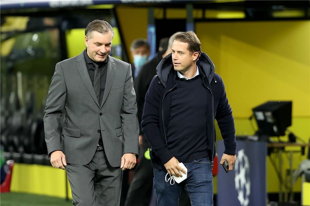 Neuer BVB-Geschäftsführer Sport Lars Ricken: „Meine Tür steht in der Regel offen“ Michael Zorc und Lars Ricken laufen über den Platz.