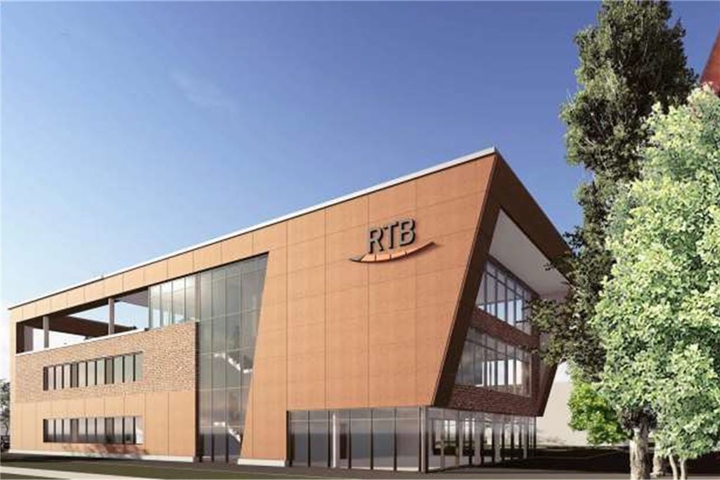 Schräge Sache läuft rund: Ungewöhnlichstes Bürogebäude Kamens fast fertig So soll das Gebäude aussehen, wenn es fertig ist. Die Fassadenform greift die Neigung des benachbarten Fördergerüsts auf.